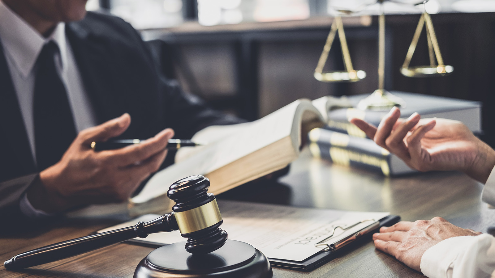 gavel-and-weights-two-people-talking_resized